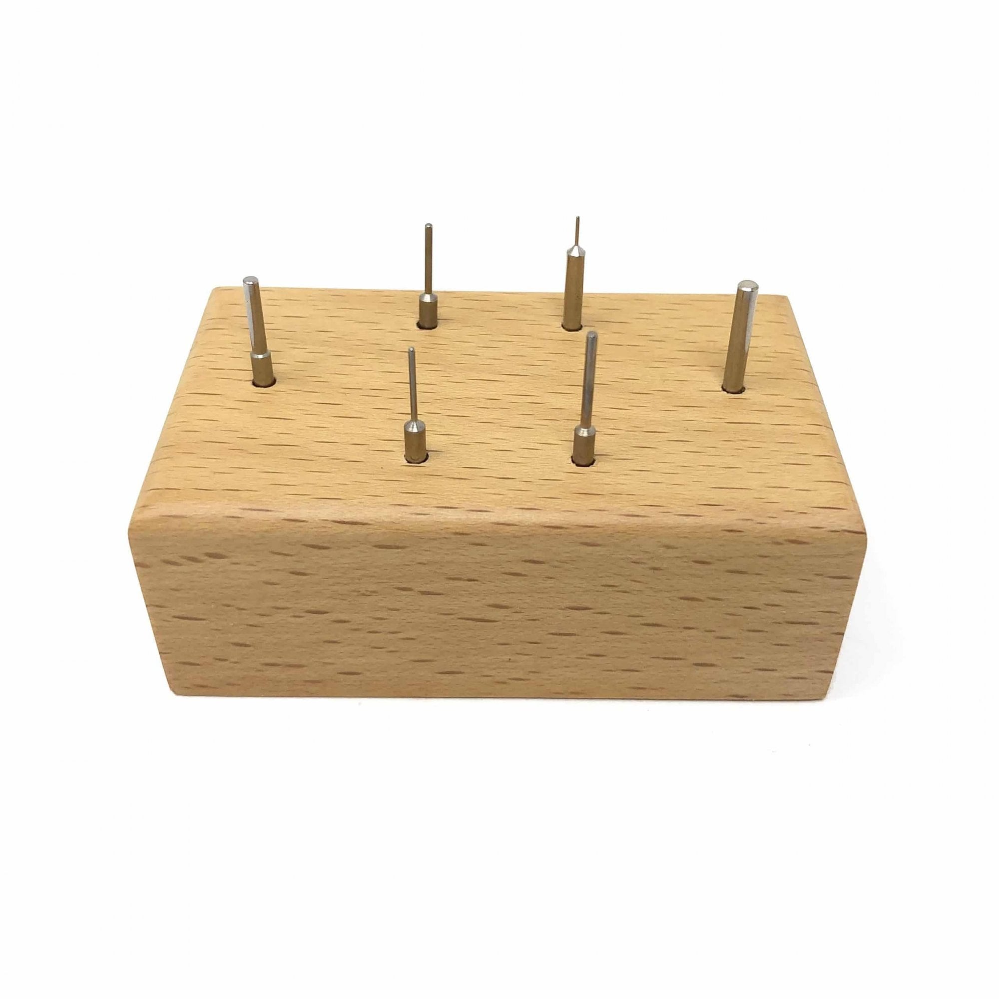 Watch Link Removing Pins on Wooden Stand